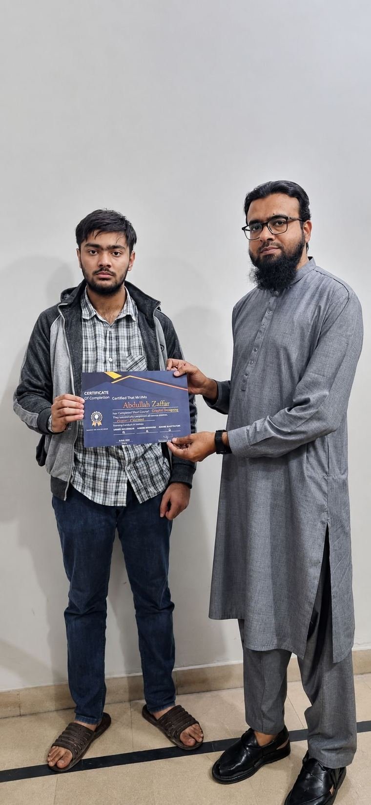 InnoTech graduate receiving a certificate at the Jubilee Town campus
